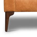 Fauteuil de salon moderne en cuir couleur cognac avec cadre en bois séché au four