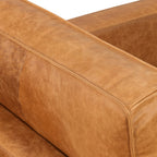 Fauteuil de salon moderne en cuir couleur cognac avec cadre en bois séché au four