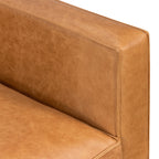 Fauteuil de salon moderne en cuir couleur cognac avec cadre en bois séché au four