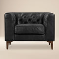 Modern Onyx Black Leather Lounge Chair with Tufted Back