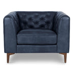 Fauteuil de salon en cuir bleu nuit, style classique moderne avec dossier capitonné
