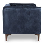 Fauteuil de salon en cuir bleu nuit, style classique moderne avec dossier capitonné