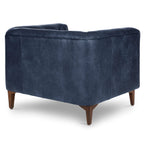 Fauteuil de salon en cuir bleu nuit, style classique moderne avec dossier capitonné