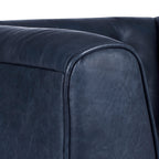 Fauteuil de salon en cuir bleu nuit, style classique moderne avec dossier capitonné