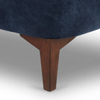 Fauteuil de salon en cuir bleu nuit, style classique moderne avec dossier capitonné