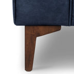 Fauteuil de salon en cuir bleu nuit, style classique moderne avec dossier capitonné