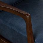 Fauteuil moderne en cuir bleu nuit avec cadre en bois séché au four