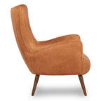 Fauteuil de salon traditionnel en cuir couleur cognac avec un cadre en bois séché au four