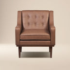 Fauteuil de salon moderne en cuir marron caramel avec dossier capitonné