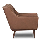 Fauteuil de salon moderne en cuir marron caramel avec dossier capitonné