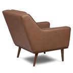 Fauteuil de salon moderne en cuir marron caramel avec dossier capitonné