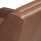 Fauteuil de salon moderne en cuir marron caramel avec dossier capitonné