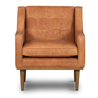 Fauteuil de salon moderne en cuir cognac avec dossier capitonné