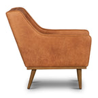 Fauteuil de salon moderne en cuir cognac avec dossier capitonné