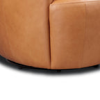 Fauteuil pivotant moderne en cuir tanné de couleur bourbon avec base pivotante