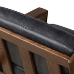Fauteuil de salon moderne en cuir noir onyx avec dossier capitonné