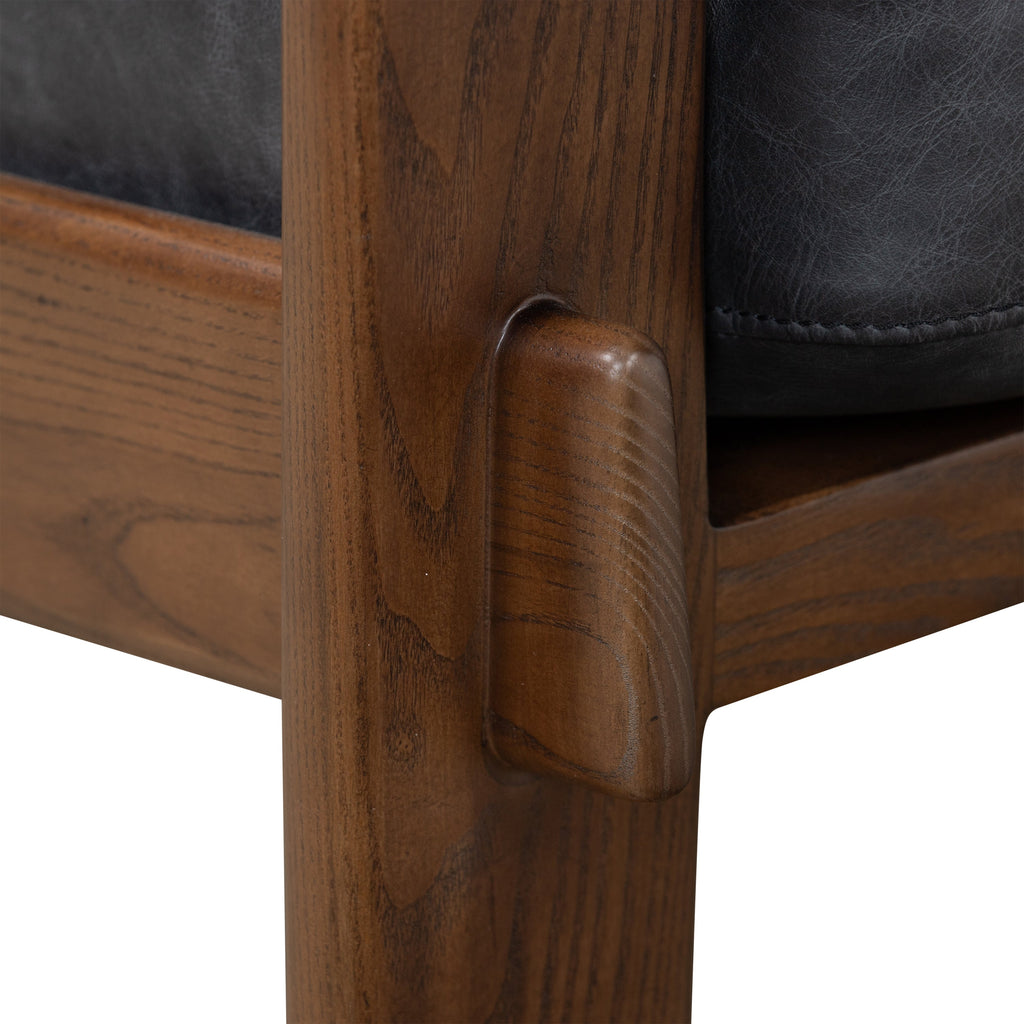 Modern Onyx Black Leather Lounge Chair with Tufted Back