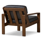Fauteuil de salon moderne en cuir noir onyx avec dossier capitonné