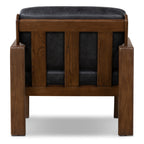 Fauteuil de salon moderne en cuir noir onyx avec dossier capitonné