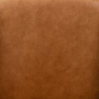 Fauteuil de salon moderne en cuir couleur cognac avec dossier capitonné