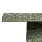 Table basse moderne en vert algue avec une structure résistante aux intempéries
