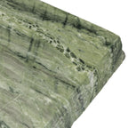Table basse moderne en vert algue avec une structure résistante aux intempéries