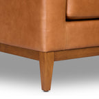 Fauteuil moderne en cuir sellier marron avec cadre en bois séché au four