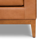 Fauteuil moderne en cuir sellier marron avec cadre en bois séché au four