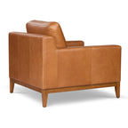 Fauteuil moderne en cuir sellier marron avec cadre en bois séché au four